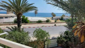 Duplex pied dans l'eau avec magnifique vue sur mer